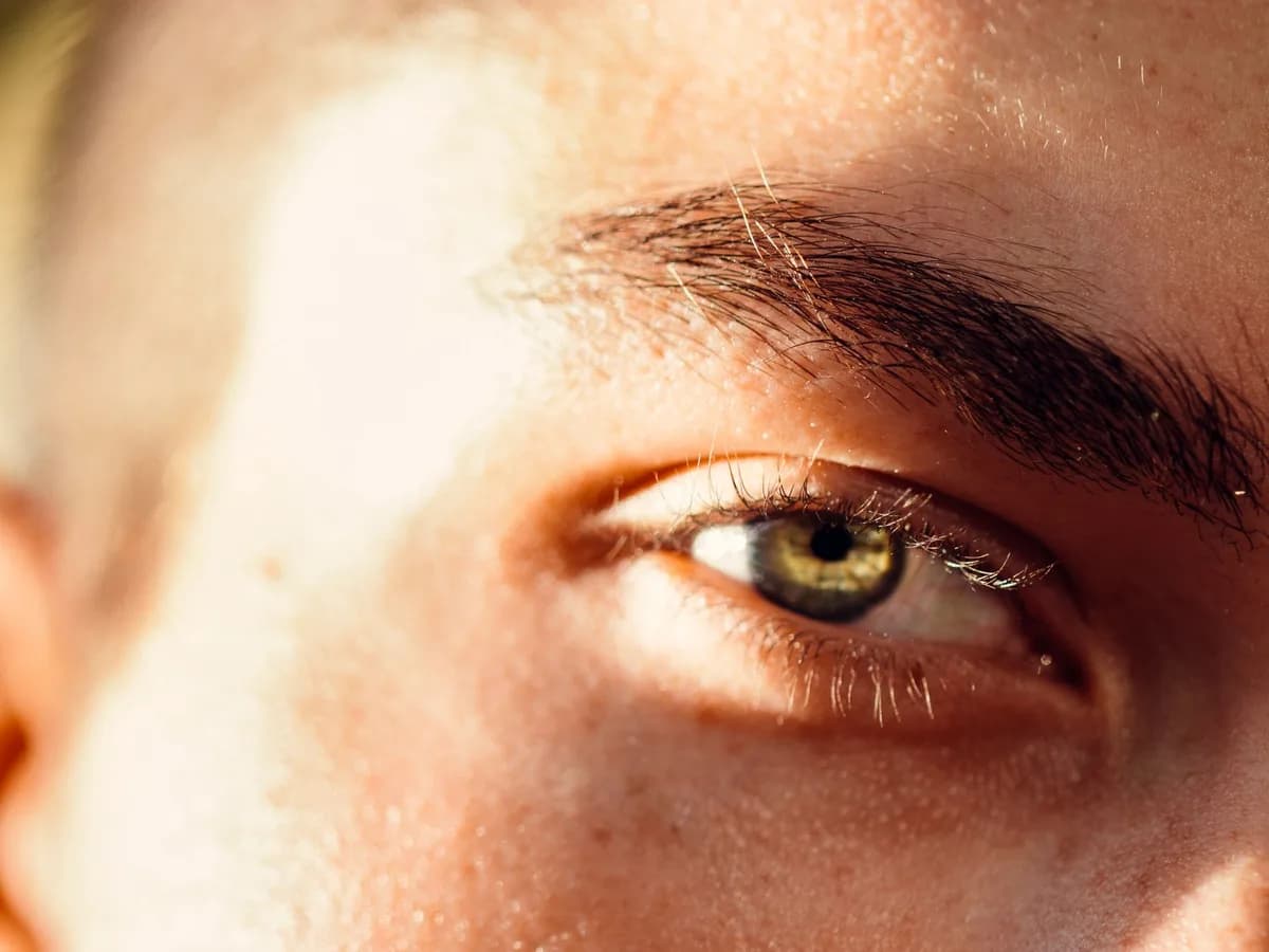 Close-up of facial skin texture around the eye and cheek