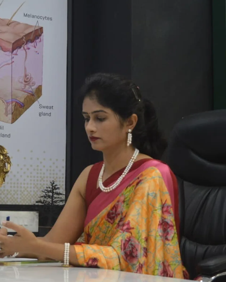 Dr. Daksha Patel during a consultation at her desk
